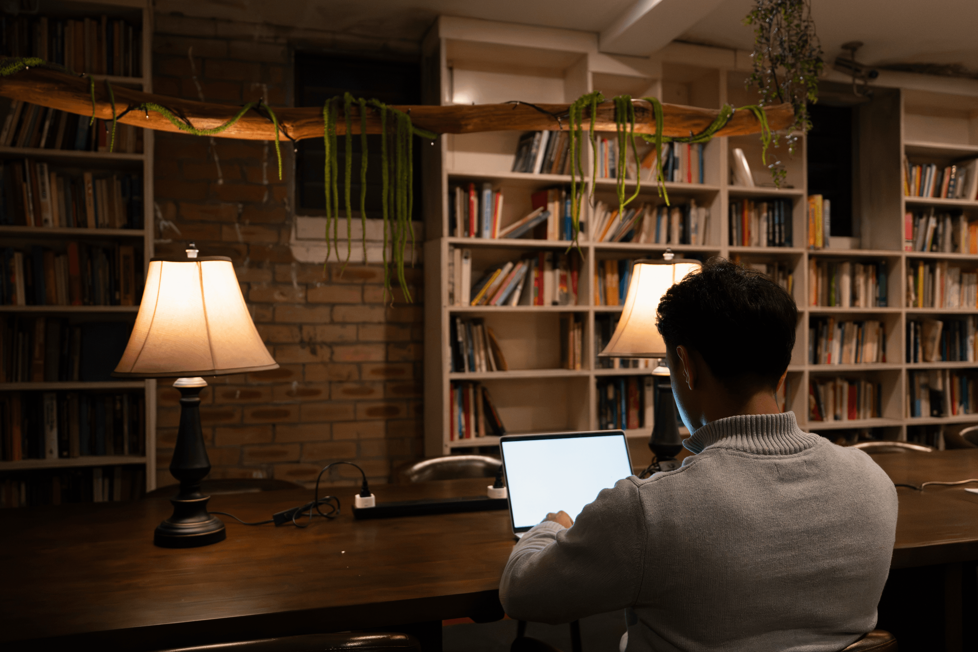 A tutor working on a laptop